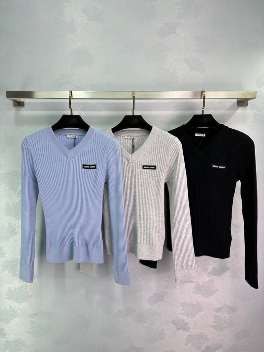 Ribbed High-Neck Wool Sweater